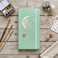 B6 dot grid journal with celestial woman cover and 180gsm white paper