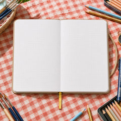Blank 5 by 5 millimeter dot grid notebook pages