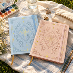 Powder blue and blush pink A5 botanical dot grid notebooks
