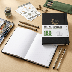 Open notebook showing 180gsm white dot grid pages