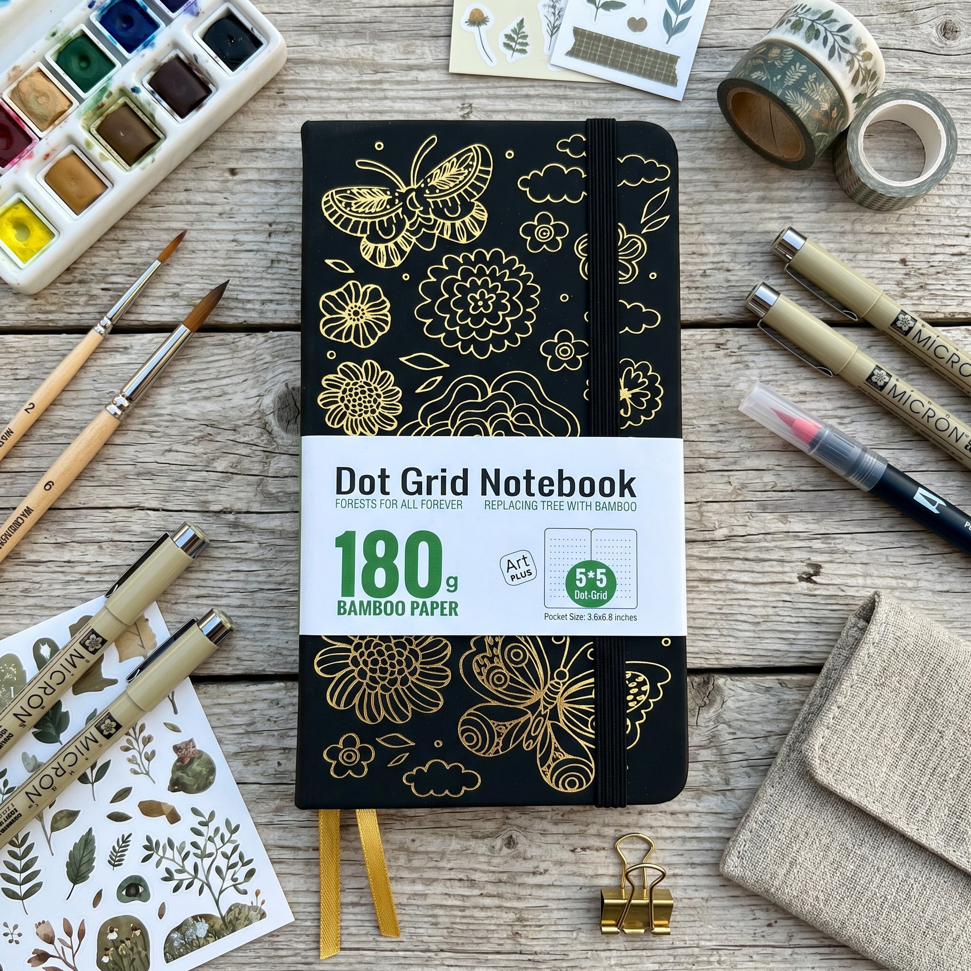 BUKE black B6 dot grid notebook with faux PU leather cover and gold butterfly floral design