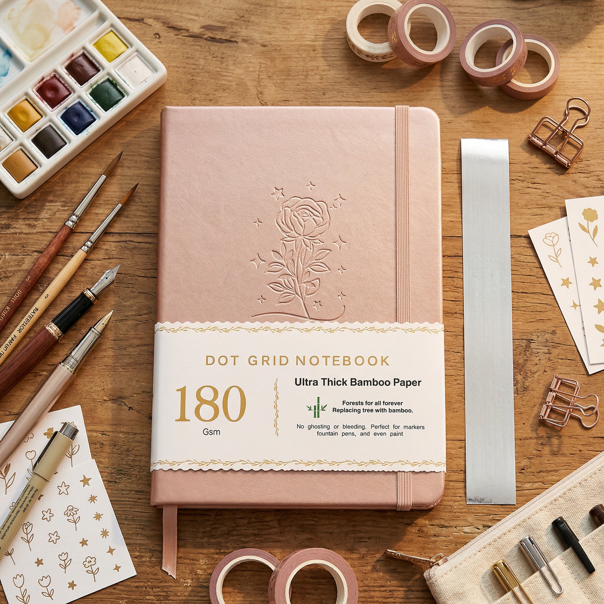 BUKE blush pink A5 dot grid notebook with embossed rose cover design