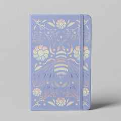 Purple bee holographic hardcover notebook with botanical design