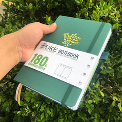 Premium green fabric notebook with botanical cover artwork
